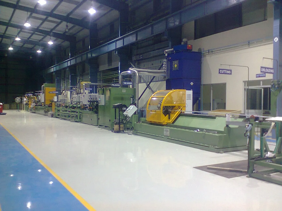 Stainless steel tube production line in a factory hall